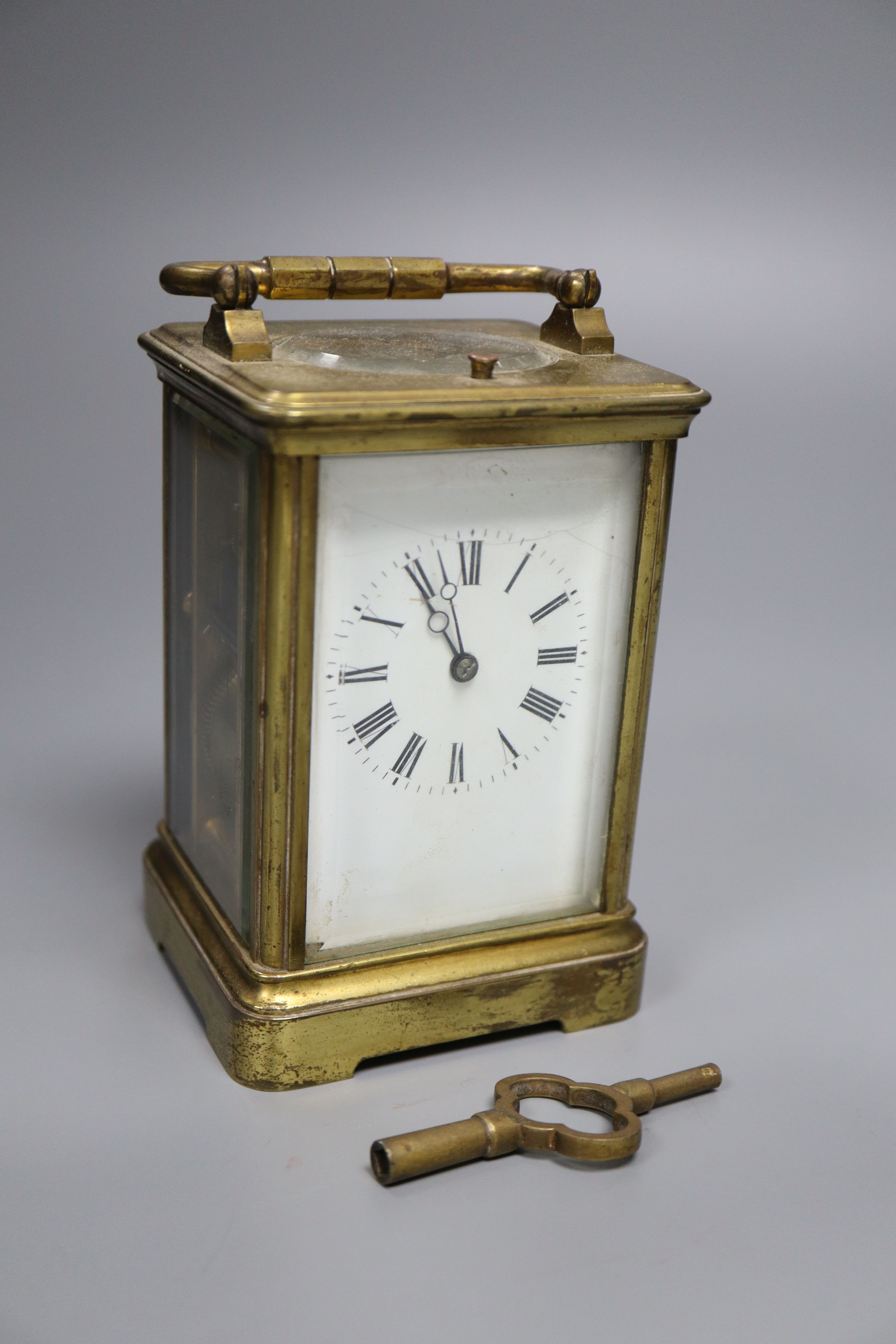 An hour repeating brass carriage clock,14cm
